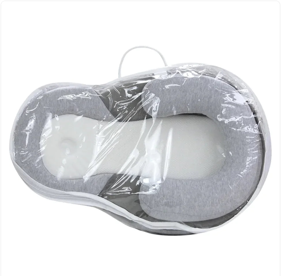 Anti-spit-up pillow for babies